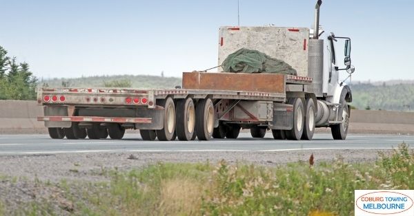 Benefits Of Using Flatbed Trucks For Hauling Construction Equipment